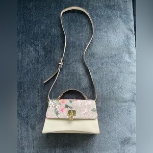 Nanette Lepore floral crossbody with lock accent closure